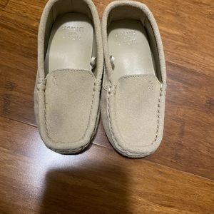 Tan loafers worn once. Small stain on one.